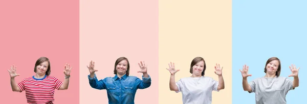 カラフルなストライプの上にダウン症候群の女性のコラージュは 自信と幸せに微笑みながら 指番号10で示し 指を上げる孤立した背景を分離しました — ストック写真