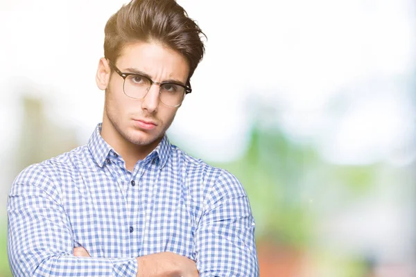Joven Hombre Guapo Con Gafas Sobre Fondo Aislado Escéptico Nervioso —  Fotos de Stock