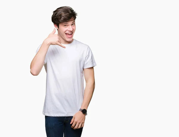 Homem Bonito Jovem Vestindo Shirt Branca Casual Sobre Fundo Isolado — Fotografia de Stock