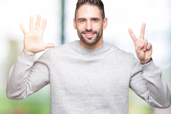 Joven Hombre Guapo Con Sudadera Sobre Fondo Aislado Mostrando Apuntando — Foto de Stock