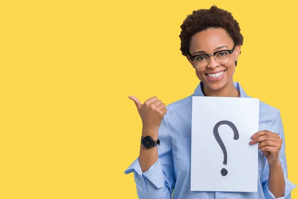 Young African American Woman Holding Paper Question Mark Isolated Background — Stock Photo, Image