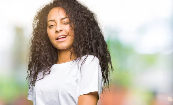 Young Beautiful Girl Curly Hair Wearing Casual White Shirt Winking — Stock Photo, Image