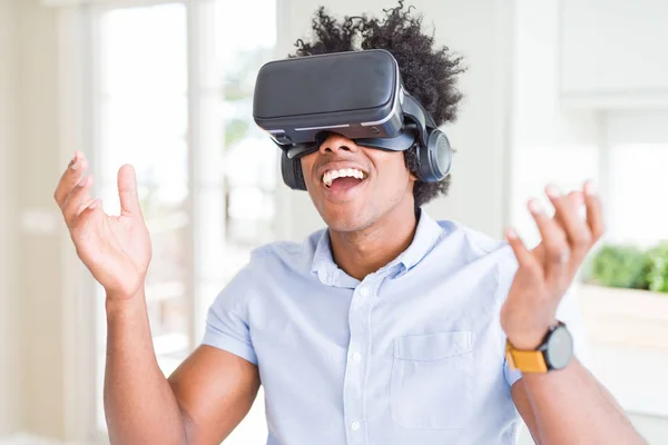 African amaerican man having fun playing with virtual reality gl — Stock Photo, Image