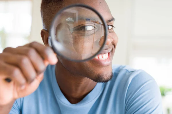 Young African Man Looking Magnifying Glass — Stock Photo, Image