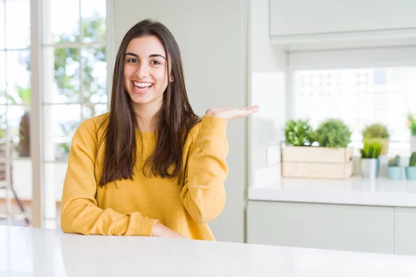 Beautiful Young Woman Wearing Yellow Sweater Smiling Cheerful Presenting Pointing — Stock Photo, Image