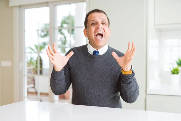 Middle Age Man Sitting Home Celebrating Crazy Amazed Success Arms — Stock Photo, Image