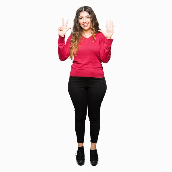 Молода Красива Жінка Червоному Светрі Показує Вказує Пальцями Номер Вісім — стокове фото