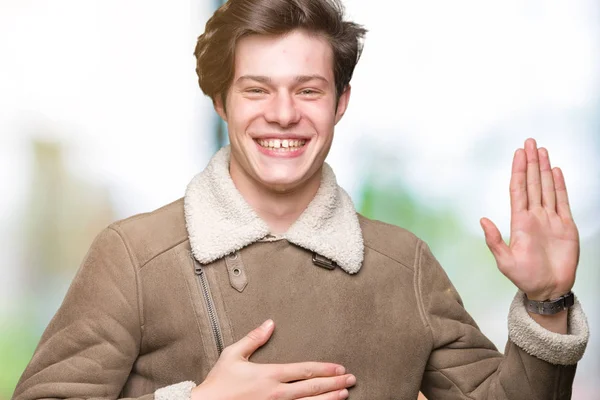 Joven Hombre Guapo Con Abrigo Invierno Sobre Fondo Aislado Juramento —  Fotos de Stock