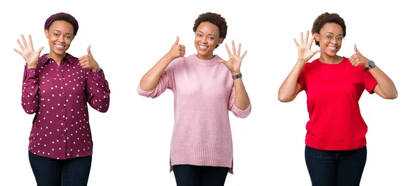非洲裔美国妇女与非洲头发在孤立的背景显示和指向用手指数字六 同时微笑着自信和快乐 — 图库照片