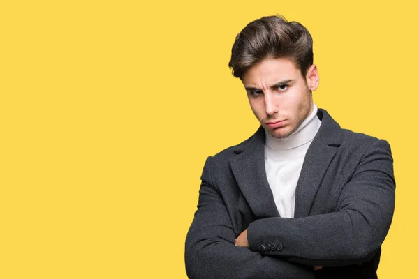 Joven Hombre Elegante Con Abrigo Invierno Sobre Fondo Aislado Escéptico —  Fotos de Stock