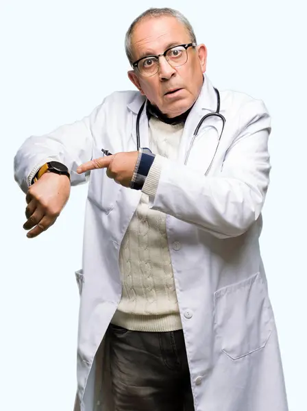 Handsome Senior Doctor Man Wearing Medical Coat Hurry Pointing Watch — Stock Photo, Image