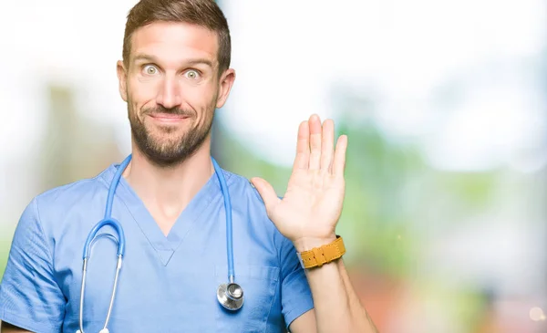 Handsome Doctor Man Wearing Medical Uniform Isolated Background Waiving Saying — Stock Photo, Image