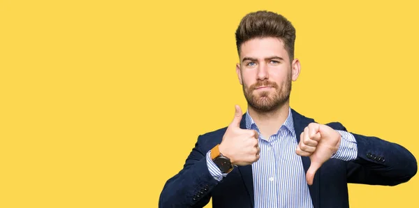 Young Handsome Bussines Man Doing Thumbs Disagreement Agreement Expression Crazy — Stock Photo, Image
