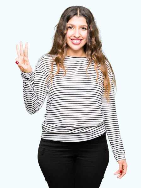 Молода Красива Жінка Светрі Показуючи Вказуючи Пальцями Номер Три Посміхаючись — стокове фото