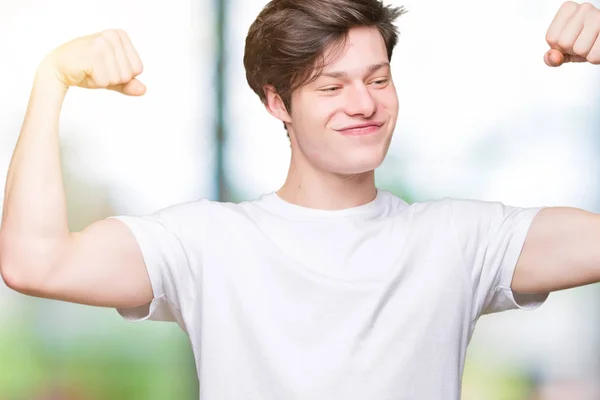 Ung Vacker Man Bär Casual Vit Shirt Över Isolerade Bakgrund — Stockfoto