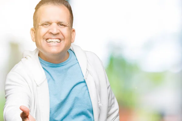 Hombre Árabe Mediana Edad Vistiendo Sudadera Sobre Fondo Aislado Sonriendo — Foto de Stock