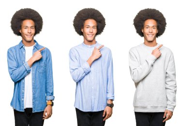 Beyaz izole arka plan neşeli üzerinde afro saçlı genç adam kolaj bir gülümseme ile el ve parmak kadar yan yüzünde mutlu ve doğal ifade ile işaret eden yüz