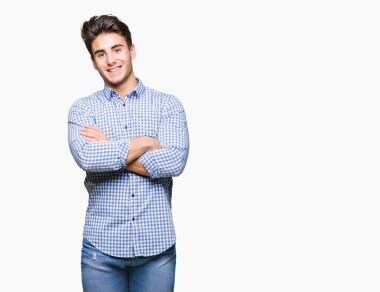 Kameraya bakarak çapraz silah ile gülümseyen izole arka plan mutlu yüzüne genç yakışıklı iş adamı. Olumlu bir kişi.