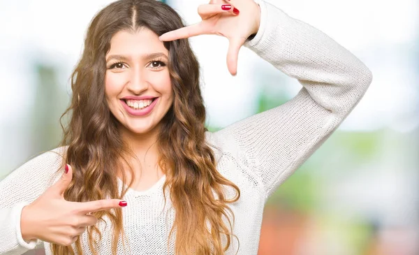 Young Beautiful Woman Wearing White Sweater Smiling Making Frame Hands — Stock Photo, Image