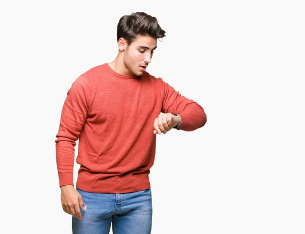 Joven Hombre Guapo Sobre Fondo Aislado Mirando Tiempo Reloj Preocupado — Foto de Stock