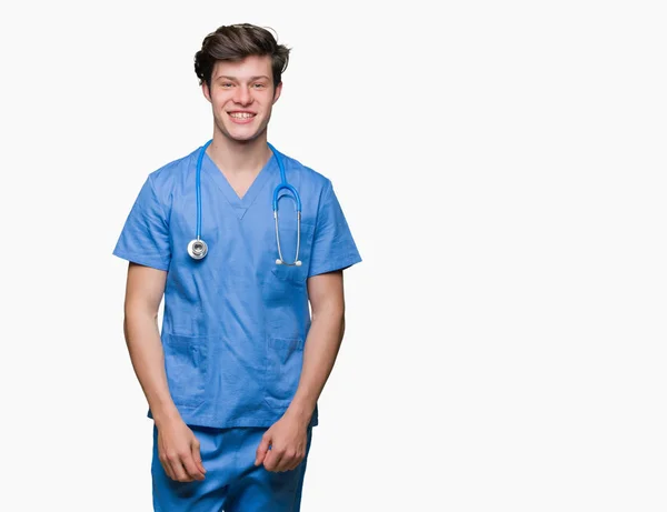 Joven Médico Vistiendo Uniforme Médico Sobre Fondo Aislado Con Una — Foto de Stock