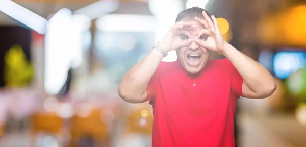 Middle Age Arab Man Isolated Background Doing Gesture Binoculars Sticking — Stock Photo, Image