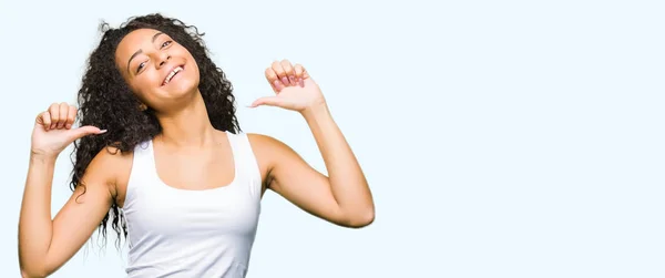 Young Beautiful Girl Curly Hair Looking Confident Smile Face Pointing — Stock Photo, Image