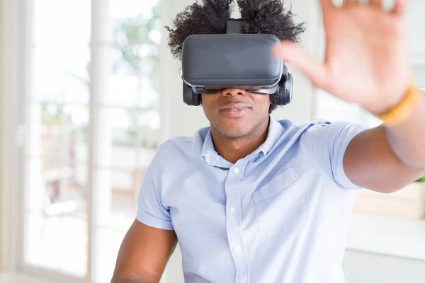 African amaerican man having fun playing with virtual reality gl — Stock Photo, Image