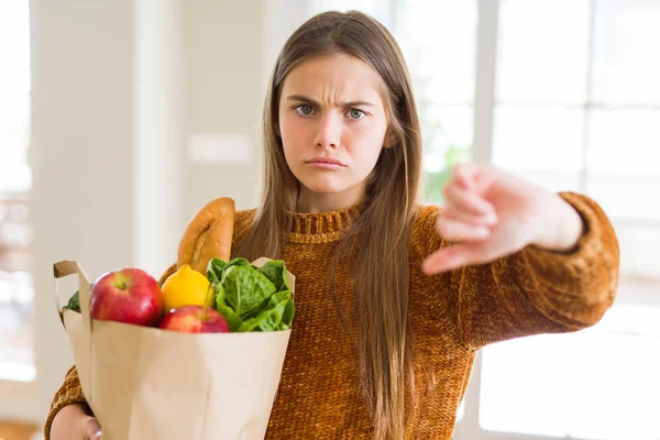 Beautiful Young Girl Holding Paper Bag Fresh Groceries Angry Face — Stock Photo, Image