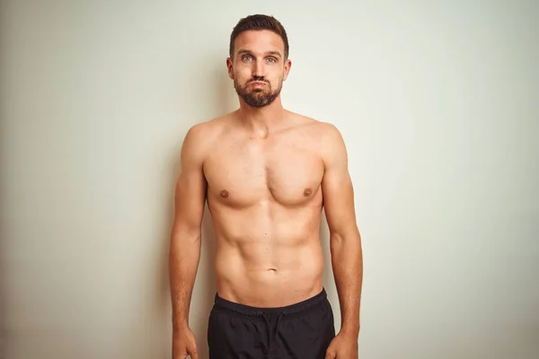 Young Handsome Shirtless Man Isolated Background Puffing Cheeks Funny Face — Stock Photo, Image