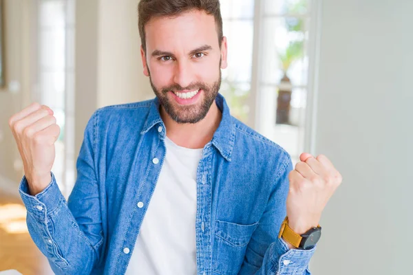 Handsome Man Home Celebrating Surprised Amazed Success Arms Raised Open — Stock Photo, Image