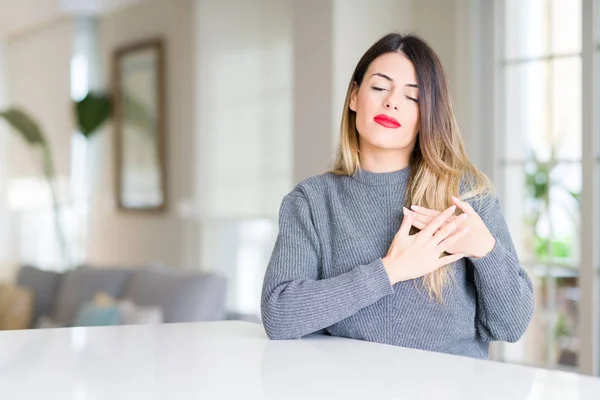 Young Beautiful Woman Wearing Winter Sweater Home Smiling Hands Chest — Stock Photo, Image