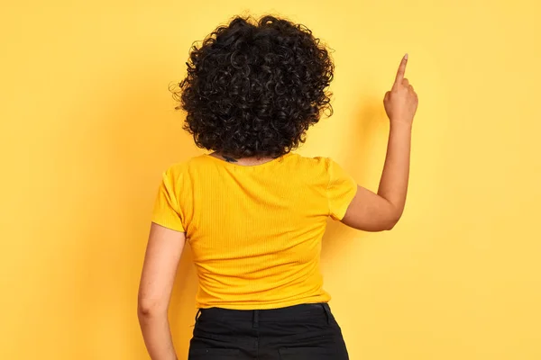 Young Arab Woman Curly Hair Wearing Shirt Standing Isolated Yellow — Stock Photo, Image