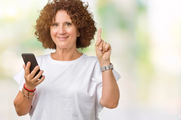 Middle Ager Senior Woman Using Texting Smartphone Isolated Background Surprised — Stock Photo, Image
