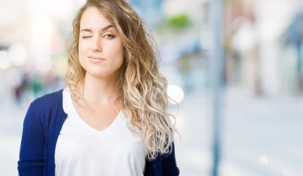 Beautiful Young Blonde Woman Isolated Background Winking Looking Camera Sexy — Stock Photo, Image