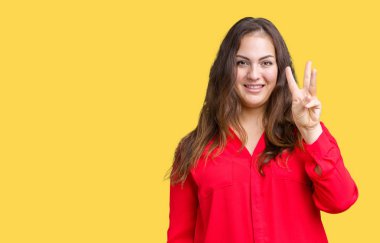 Parmakları ile kendinden emin ve mutlu gülümseyerek süre güzel artı boyutu genç iş kadını ve yukarıyı gösteren izole arka plan üzerinde üçüncüsü.