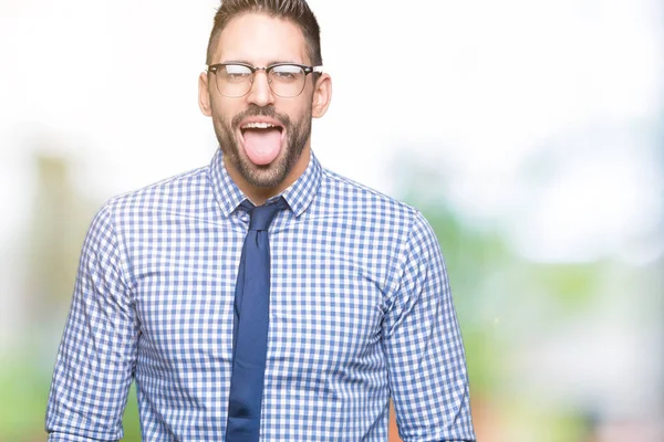 Junger Geschäftsmann Mit Brille Über Isoliertem Hintergrund Der Die Zunge — Stockfoto