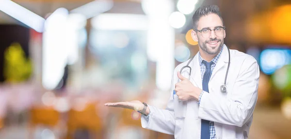 Handsome Young Doctor Man Isolated Background Showing Palm Hand Doing — Stock Photo, Image