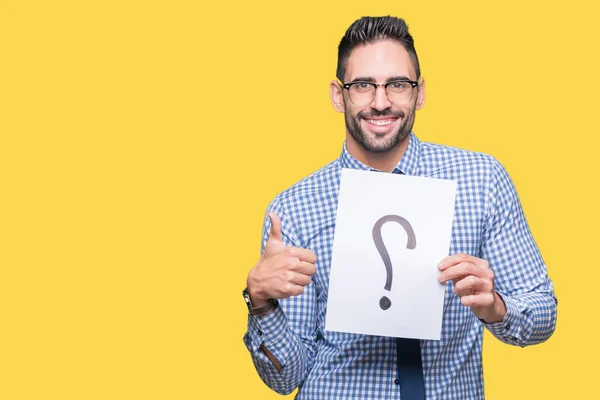 Handsome Young Business Man Holding Paper Question Mark Isolated Background — Stock Photo, Image