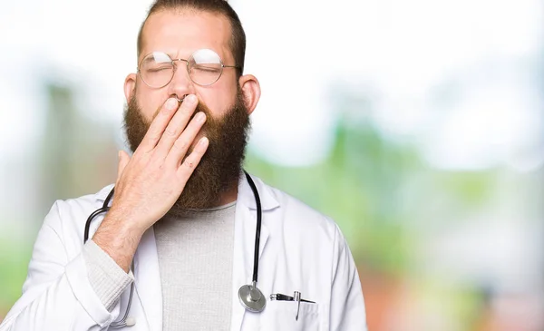 Young Blond Doctor Man Beard Wearing Medical Coat Bored Yawning — Stock Photo, Image