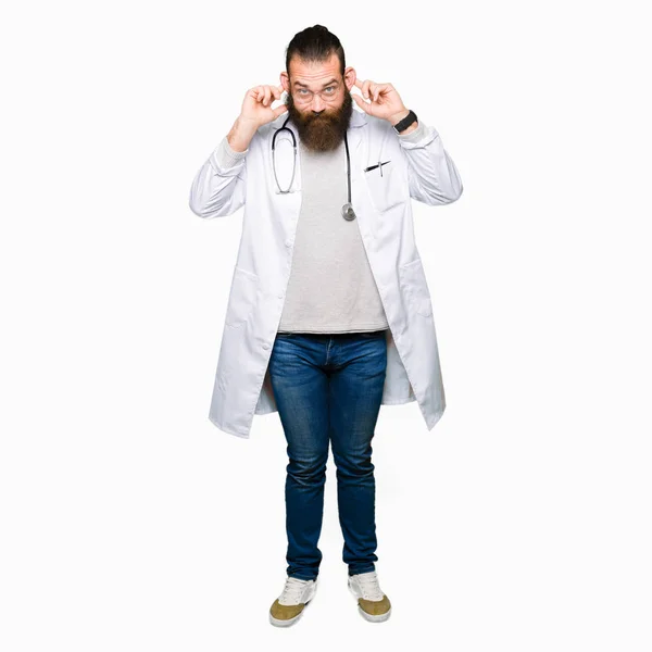 Young Blond Doctor Man Beard Wearing Medical Coat Smiling Pulling — Stock Photo, Image