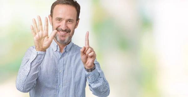 Bonito Homem Meia Idade Elegante Sênior Sobre Fundo Isolado Mostrando — Fotografia de Stock