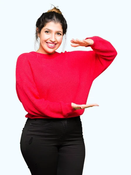 Młoda Piękna Kobieta Sobie Czerwony Sweter Bun Gestykulacji Rąk Wyświetlono — Zdjęcie stockowe