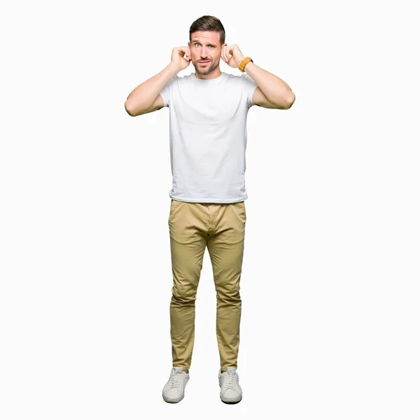 Handsome Man Wearing Casual White Shirt Covering Ears Fingers Annoyed — Stock Photo, Image