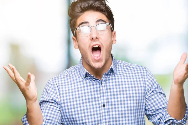 Junger Gutaussehender Mann Mit Brille Vor Isoliertem Hintergrund Feiert Verrückt — Stockfoto