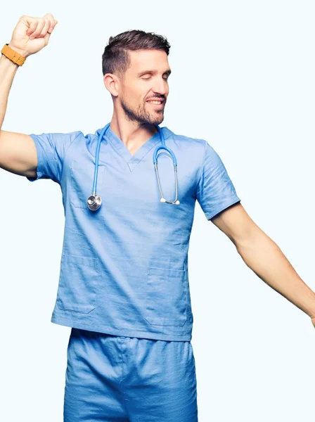 Handsome Doctor Man Wearing Medical Uniform Isolated Background Dancing Happy — Stock Photo, Image