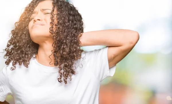 Young Beautiful Woman Curly Hair Wearing White Shirt Suffering Neck — Stock Photo, Image