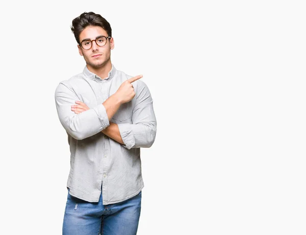 Joven Hombre Guapo Con Gafas Sobre Fondo Aislado Señalando Con —  Fotos de Stock