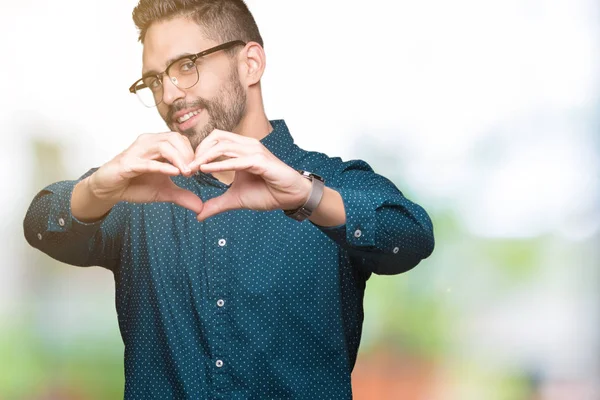 Junger Gutaussehender Geschäftsmann Mit Brille Vor Isoliertem Hintergrund Der Verliebt — Stockfoto