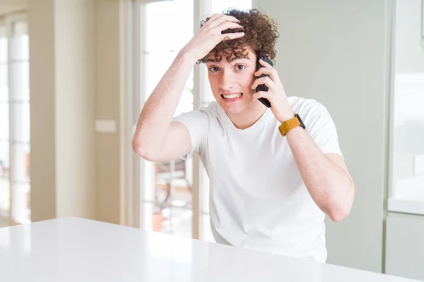Young Man Talking Phone Home Stressed Hand Head Shocked Shame — Stock Photo, Image
